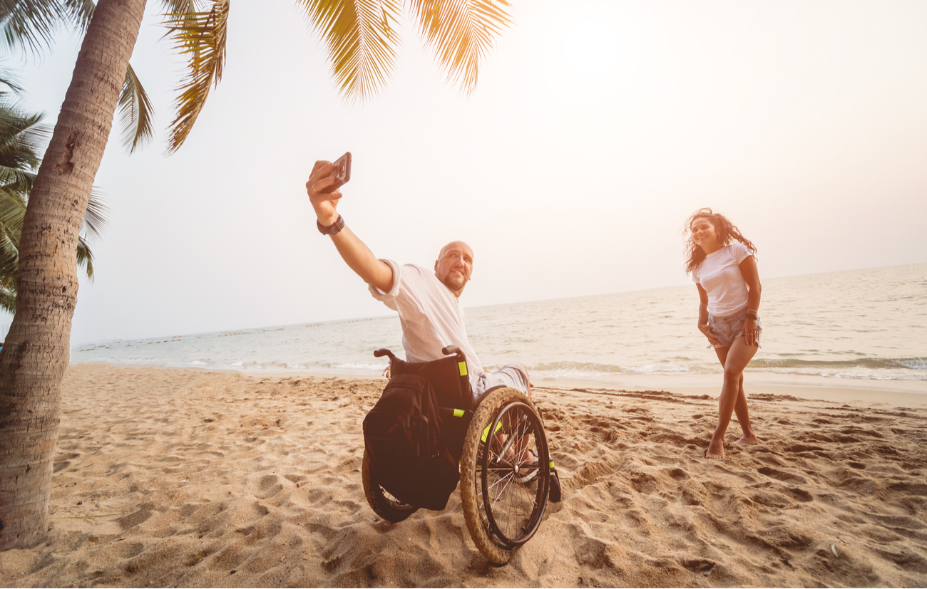 Two people enjoying a wheelchair rental