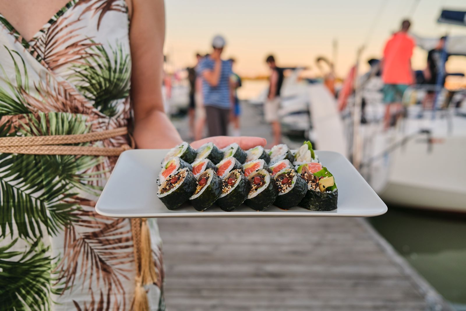 sushi plate on a waterfront dock